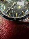 105.003-63 ed white omega speedmaster with rare decimal bezel at Brittons watches